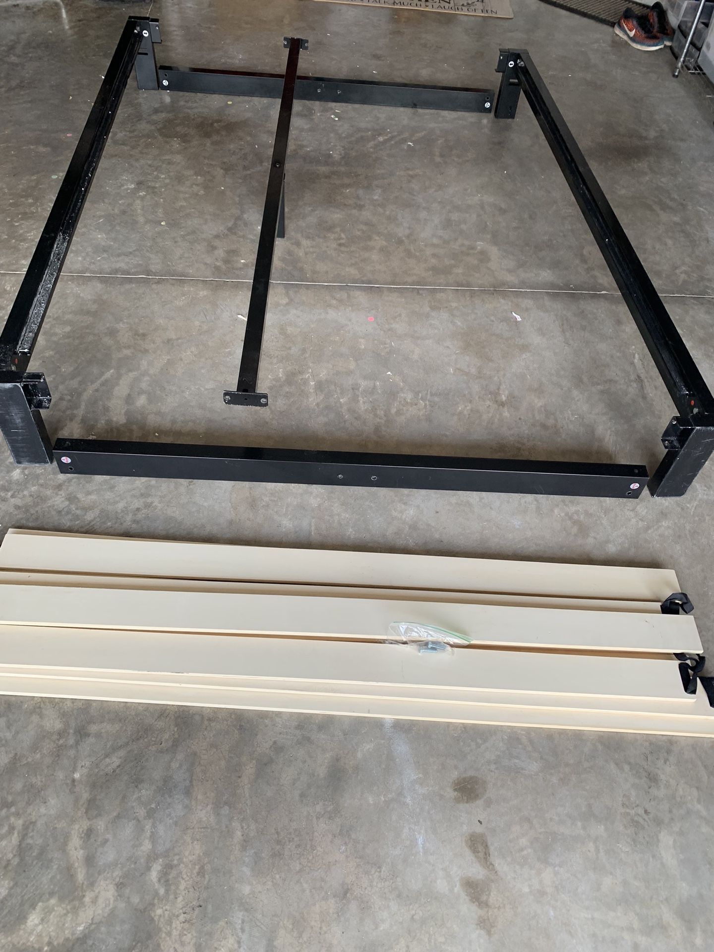 Queen Size Heavy Duty All Metal W/Wooden Slates To Support Mattress. No Box springs Needed. Has Middle Metal Support For Added Support.