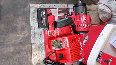 Half inch impact with battery and charger.