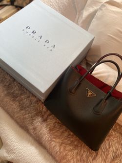 Purchase in Rome. Prada purse with receipt, box and dust bag. Must be able to meet at bank.