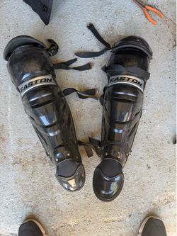 Easton adult catcher’s shin guards (15”) in good used condition.