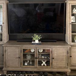 Entertainment stank with side cabinets like new”