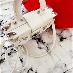 👜