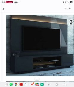 TV STAND WITH ATTACHED WALL PANEL NEW IN BOX
