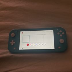 Nintendo Switch Lite/blue 25.9GB + Charger