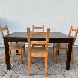 Extendable Ikea dining table with 4 chairs