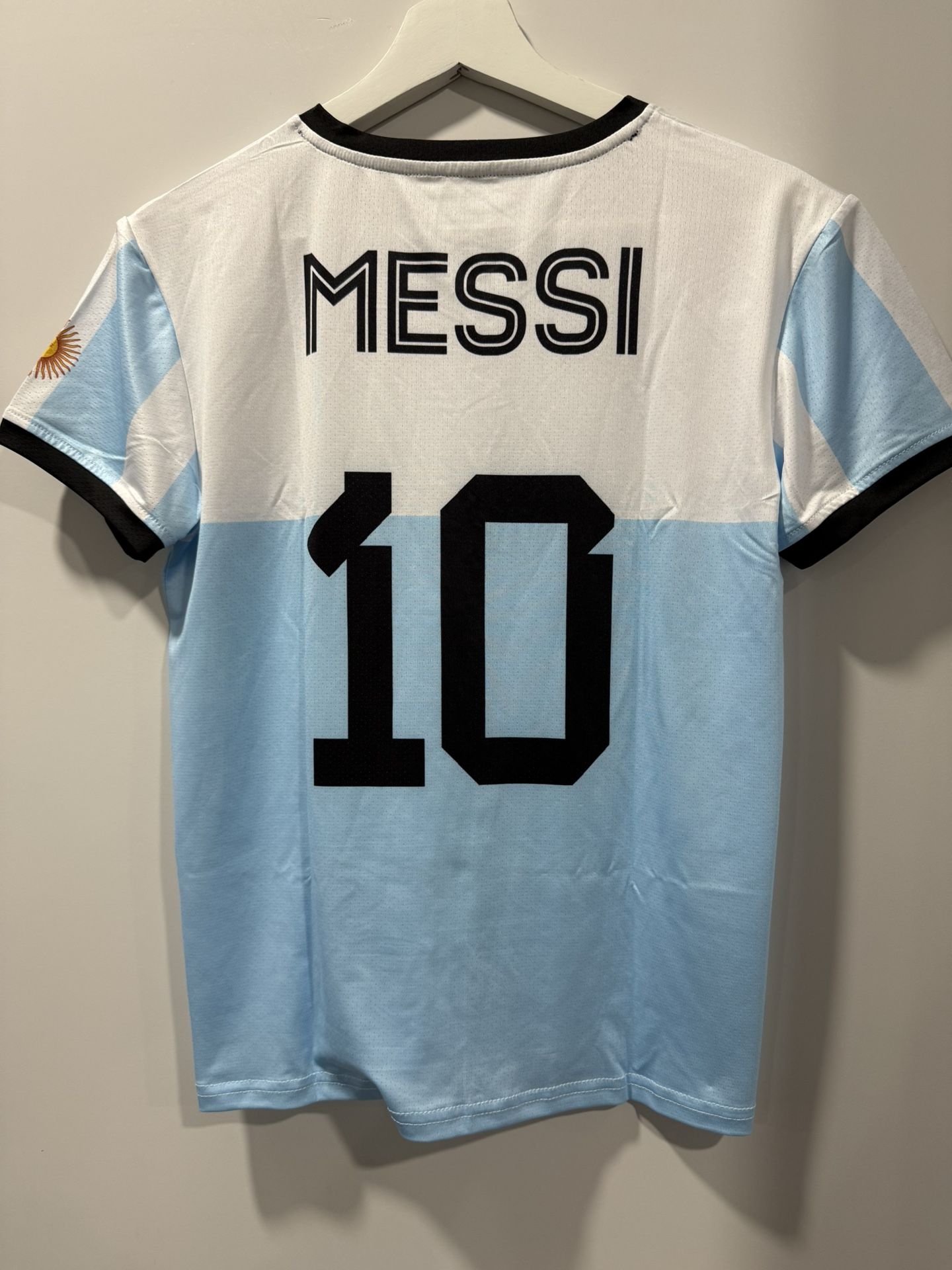Brand new Argentina Messi Youth soccer jersey & shorts size 12 Youth.