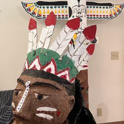Totem Pole And Native American Chief Bust