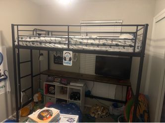 Twin size bed with desk