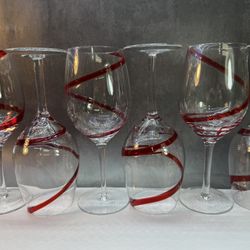 Set of (6) Pier 1 Swirline Red balloon wine glasses  hand-blown glass with a red ribbon swirl design. 