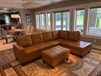 Carmel leather sectional couch and ottoman