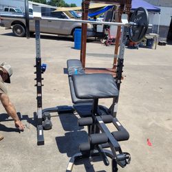 Pro form weight bench 2'45s and 2 dumbells