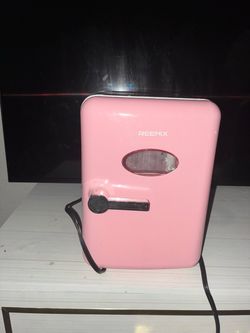 Pink mini fridge