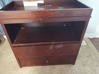 Used brown baby changer dresser