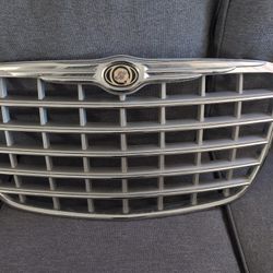 06,Brand new OEM 300C SRT8 OEM Front Chrome Grill and car cover?