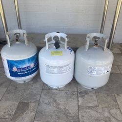 3 Propane Tanks One Full