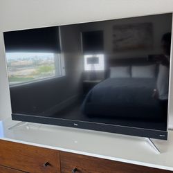 55” Inch TCL Flatscreen LED Television With Roku TV On Stand