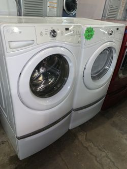 WHIRLPOOL front load washer and matching electric dryer with pedestal in excellent conditions