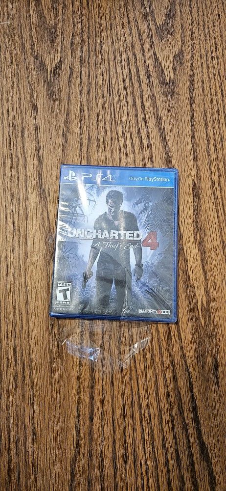 Playstation 4 Uncharted 4 A Thiefs End (New ripped Seal)