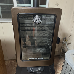 Pit Boss the smoker big one with a glass on the front