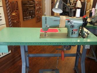 Industrial Consew Sewing Machine Model 99 CONSEW MODEL 99, SIT-DOWN MACHINE WITH TABLE AND MOTOR