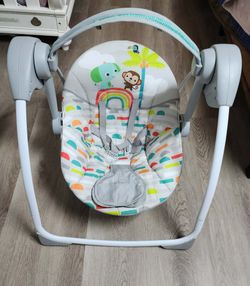 Bright Starts Playful Paradise

Compact Portable Swing /Columpio Portátil Compacto