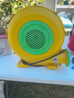 yellow/green inflatable jumper (bounce-house) air blower
