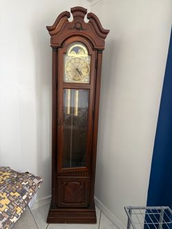 Reloj antiguo de pendulo