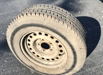 P 235 Firestone single Tire and Rim