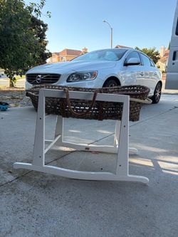 Moses basket bassinet with rocker.