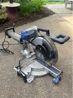 Kobalt miter saw (12 inch) comes with stand and extra blade