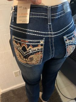 Dark Wash Skinny Jeans with White Stitching