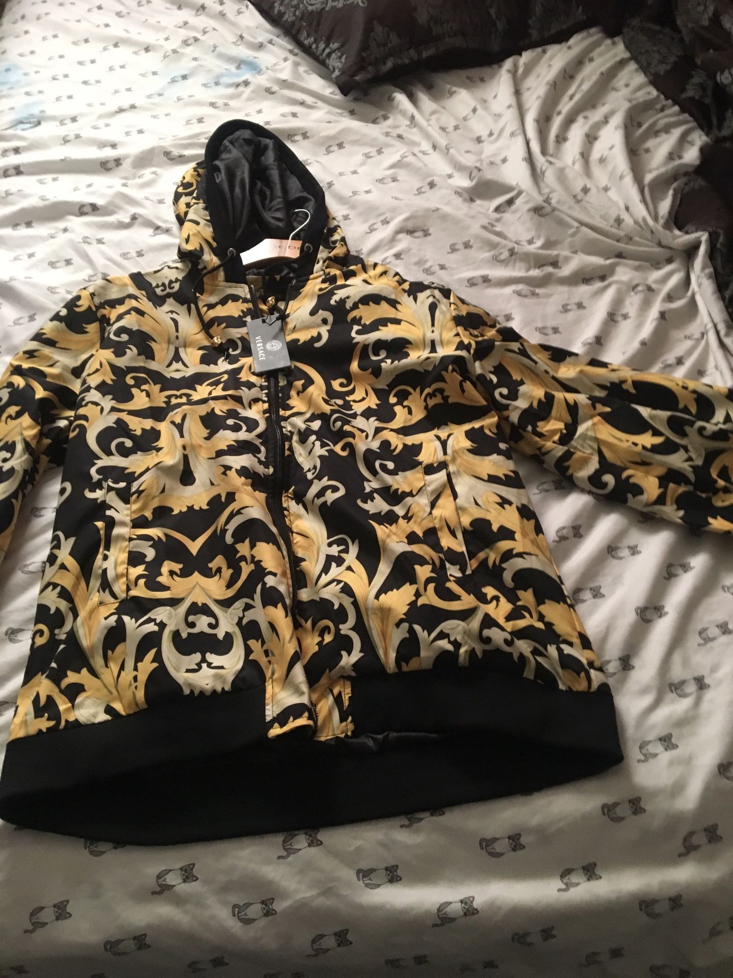 Brand New Versace Jacket..Authentic and never been worn.Will discuss price with only seriously interested buyers..