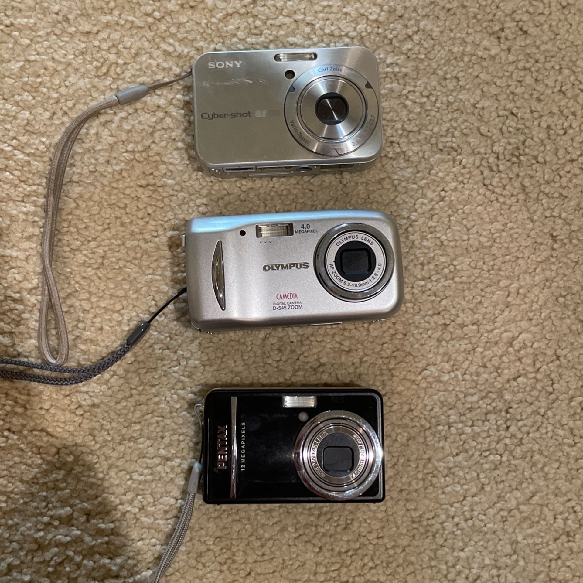 Three Digital Cameras (Sony, Olympus, Pentax)