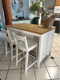 IKEA island/storage and 2 chairs