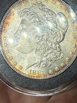 1883-p toner Morgan dollar