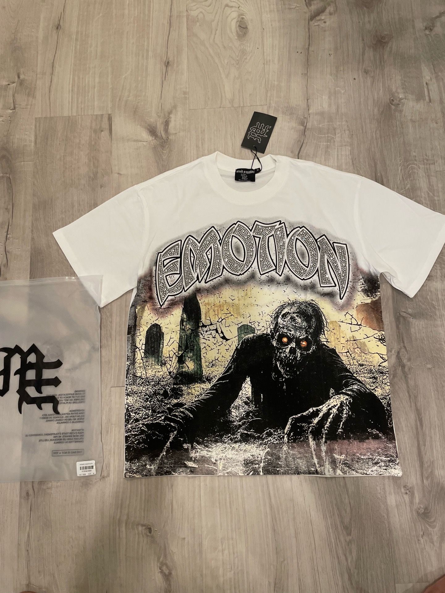 Mixed emotion T-shirt brand new - size M