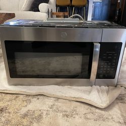 GE 1.6-cu ft 1000-Watt 29.9-in Over-the-Range Microwave (Stainless Steel)