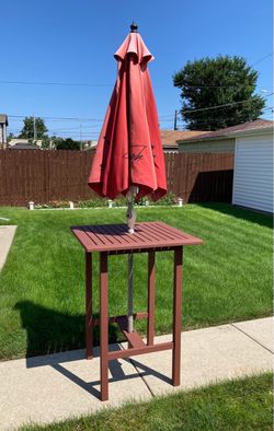 Outdoor Bistro Table with Red Patio Umbrella