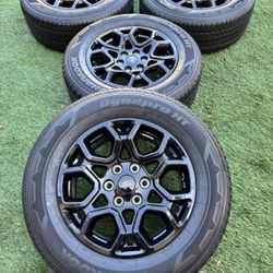 Ford f150 rims and tires 265/60/18