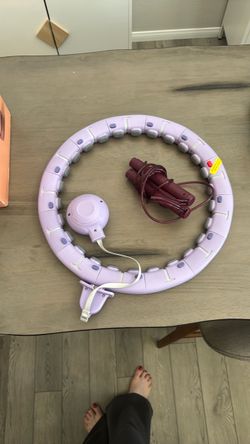 Reebok, jump rope and weighted exercise hoop