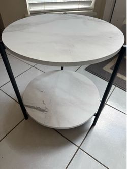 2-tier modern round side table featuring a marble white finish top and a sturdy black metal