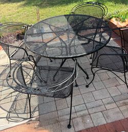 Vintage wrought iron outdoor table and chairs