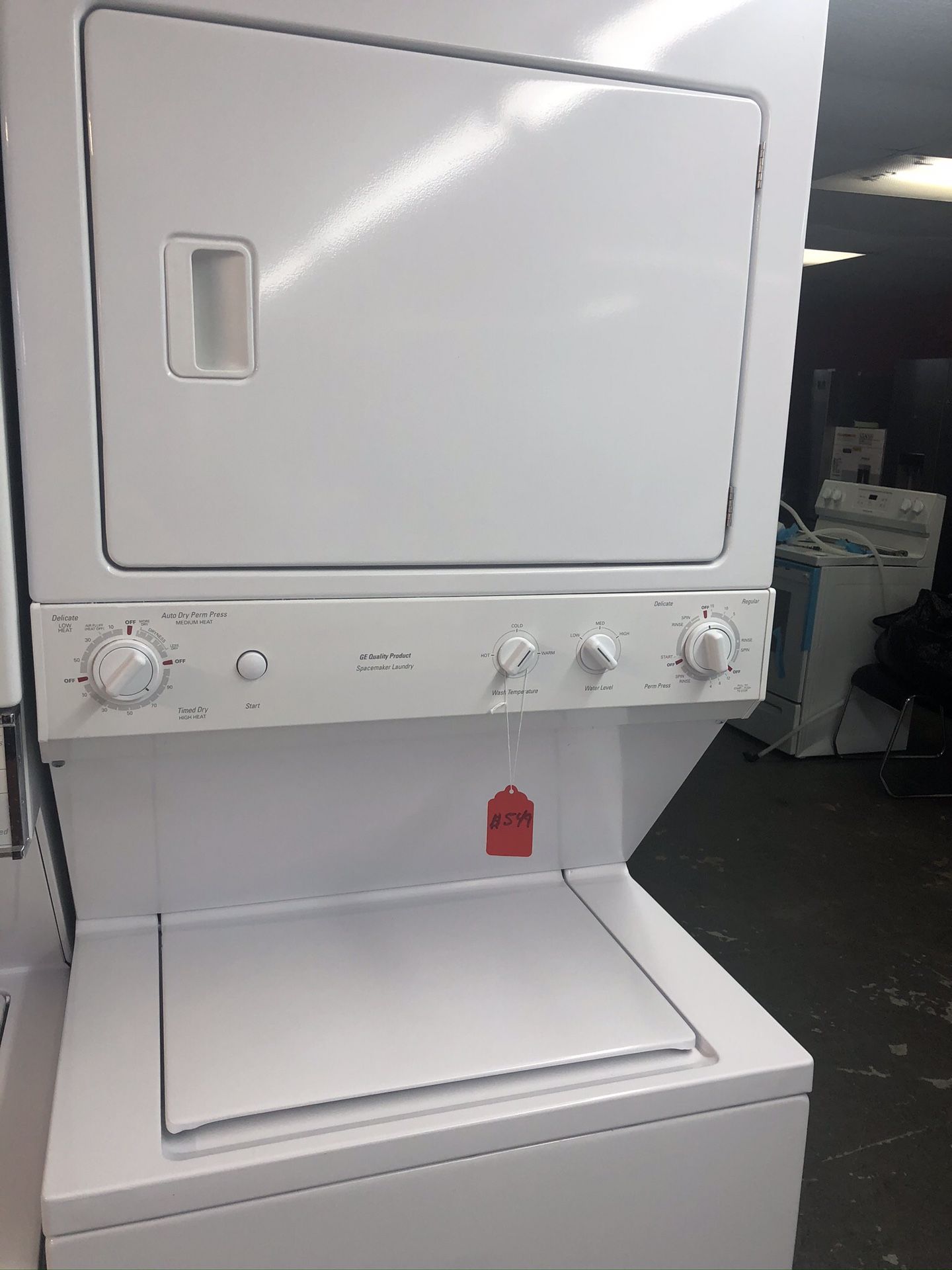 Used GE 27” stackable. 1 year warranty