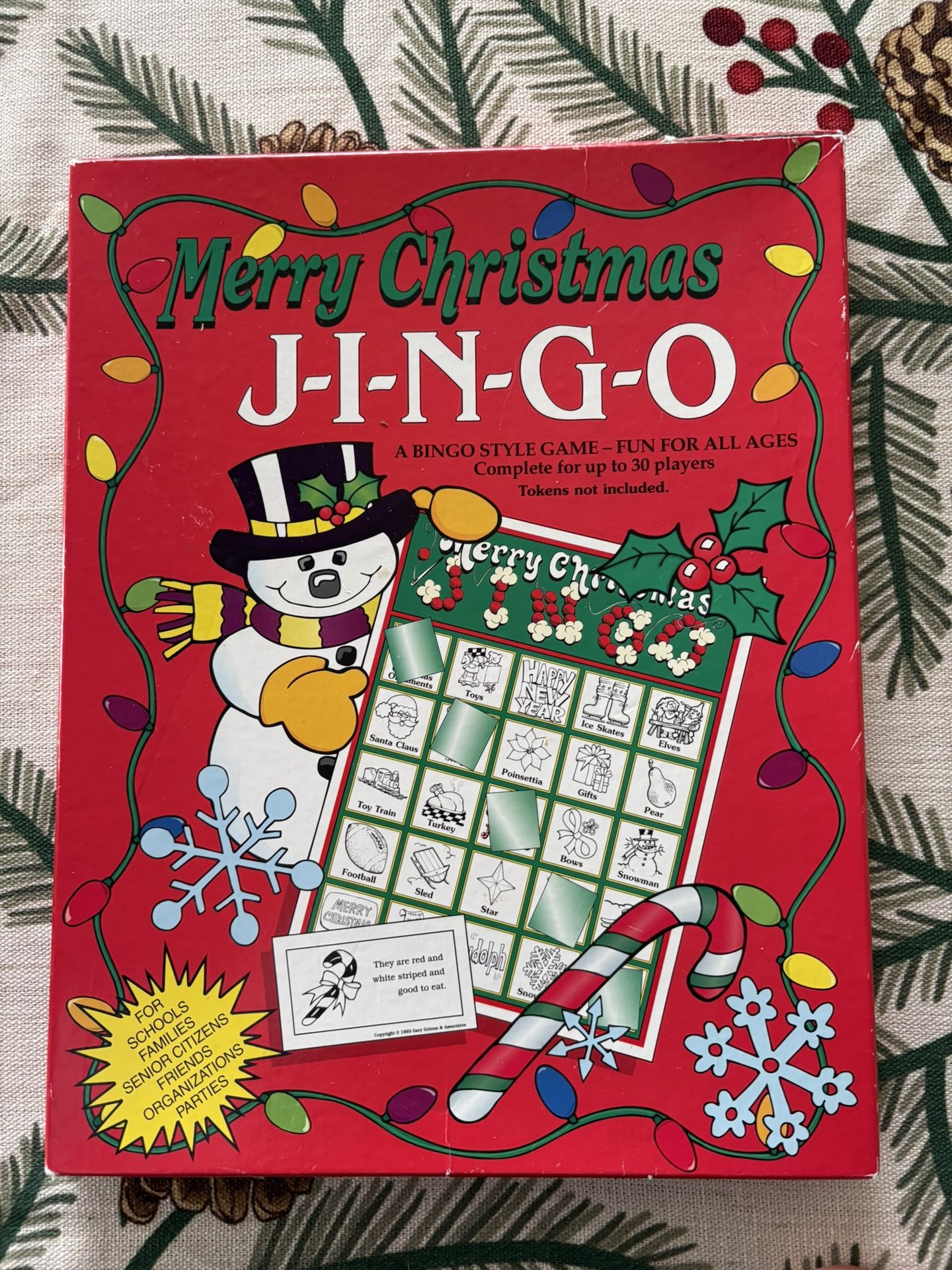 Merry Christmas Jingo. It is a variation of Bingo where players match pictures that correspond to trivia questions