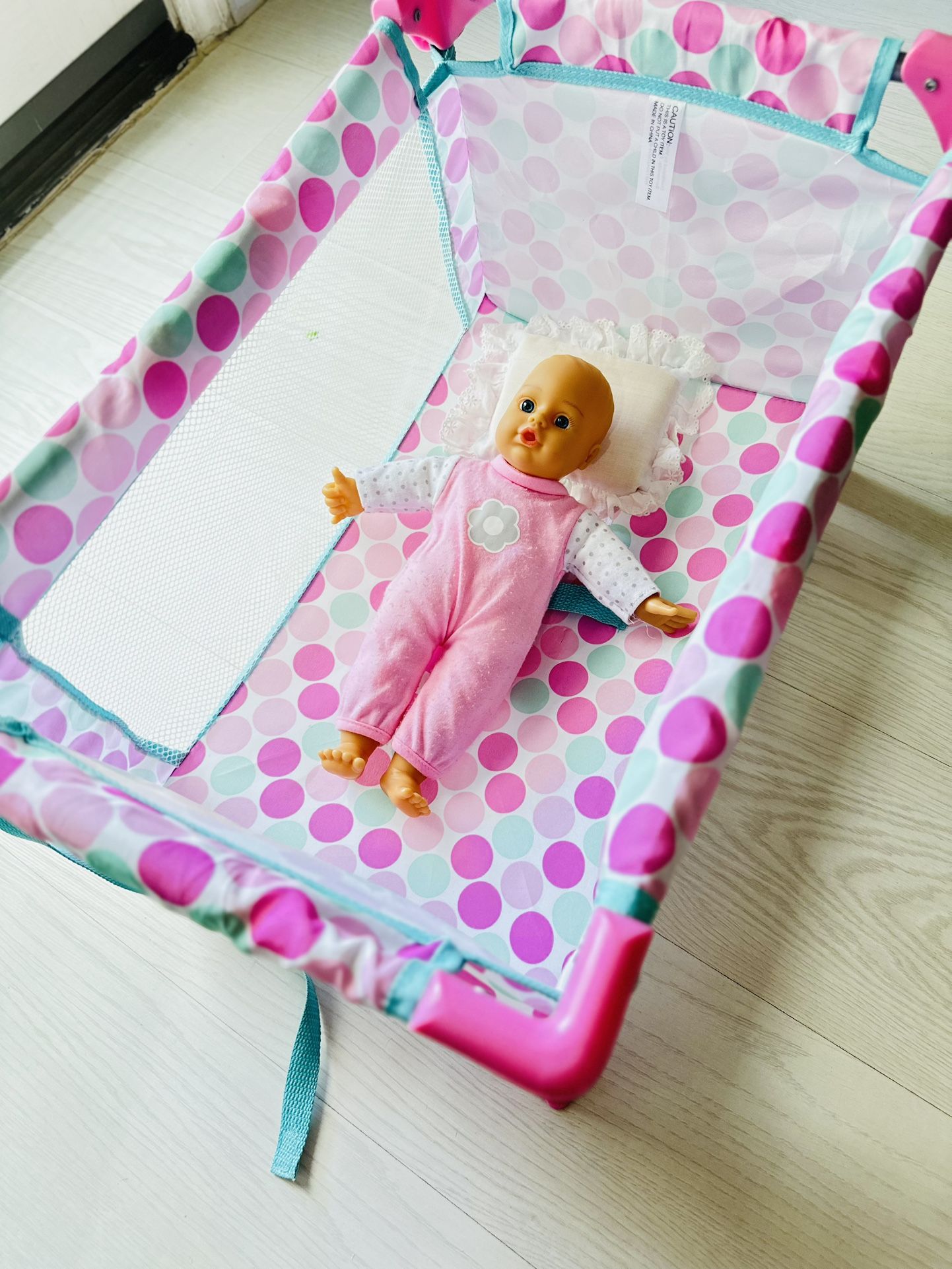 Crib toys come with a doll, foldable