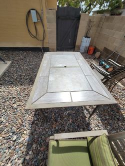 Patio Table And Chairs $250.00