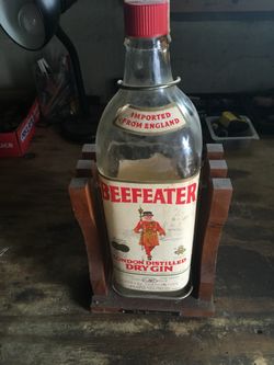 Antique Liquor Bottle ( $ cup of coffee )