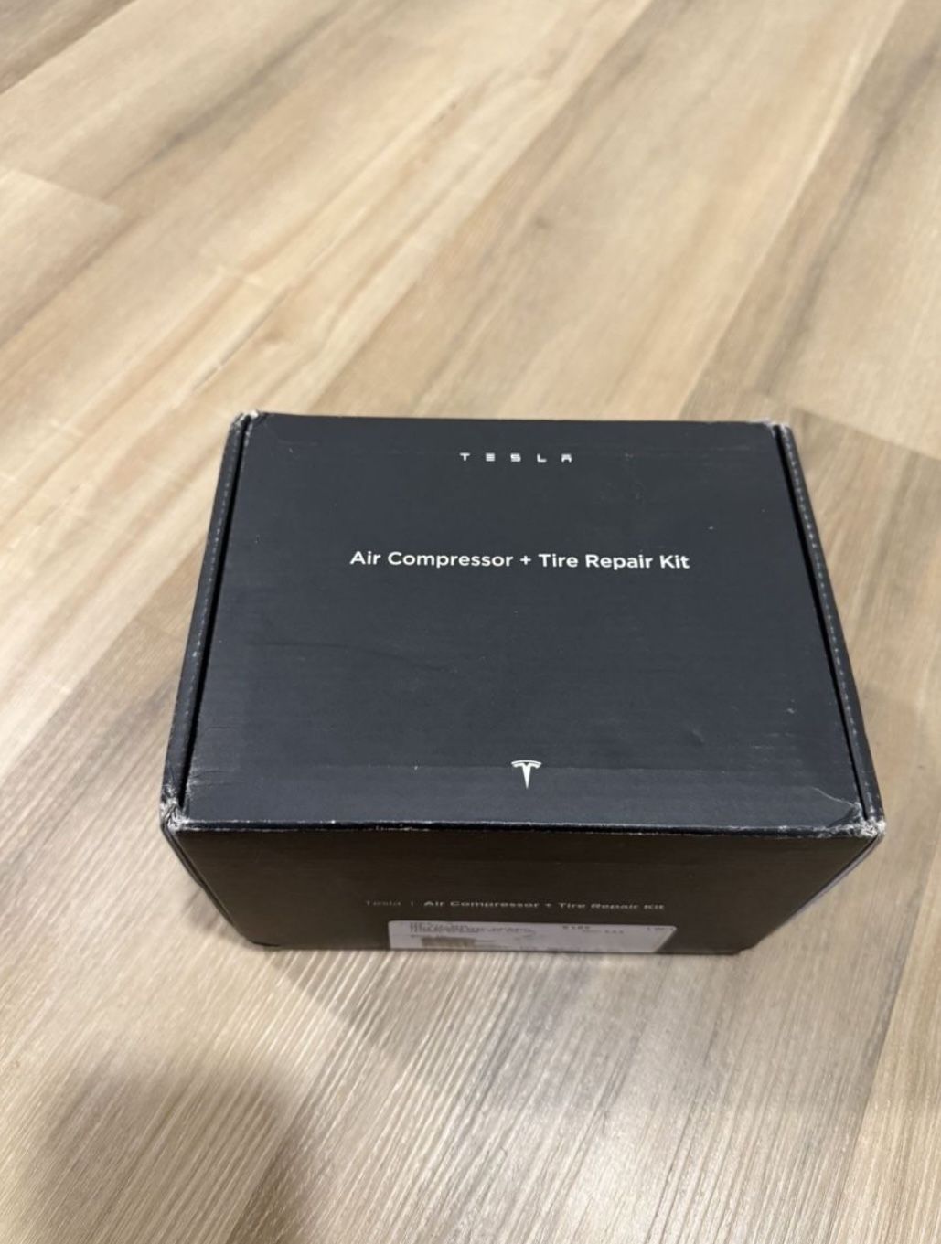 New Tesla Air Compressor And Tire Repair Kit