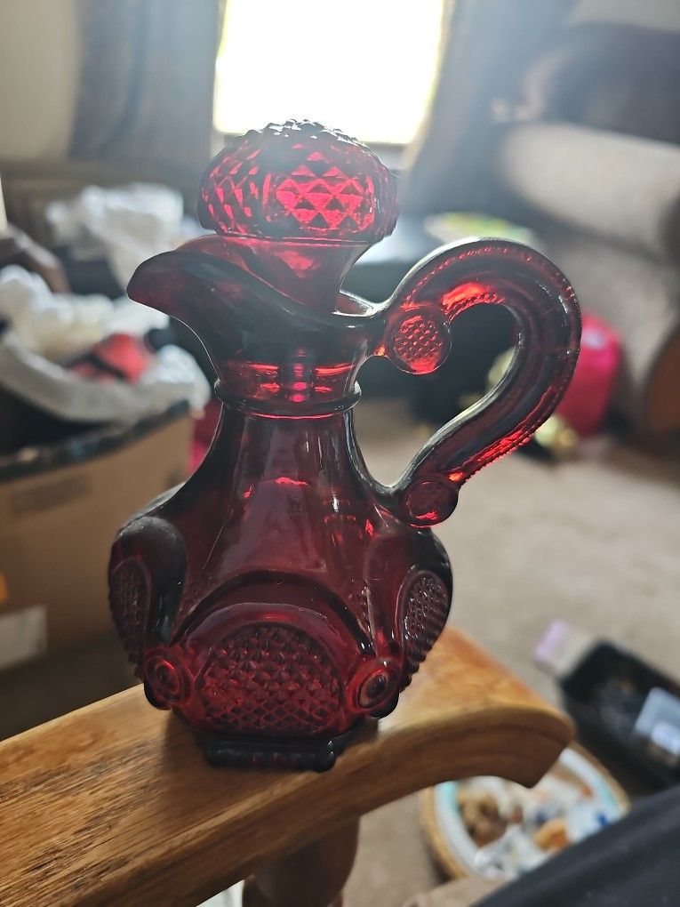 Avon burgundy glass cologne pitcher