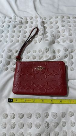 Coach embossed Wristlet